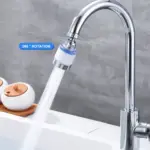Chrome kitchen faucet with 360-degree rotating nozzle.