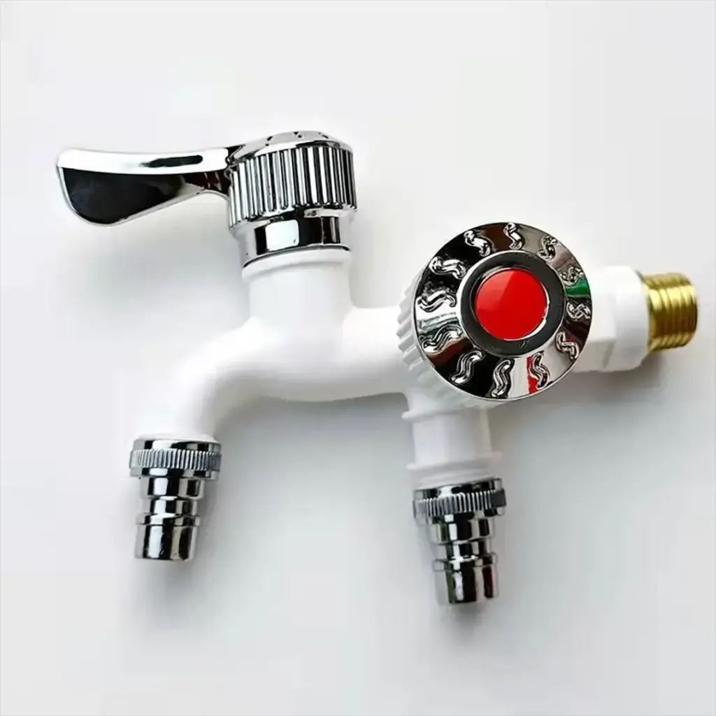 Dual-outlet white faucet with chrome accents and red button.