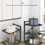Multi-tier kitchen storage rack with pots and pans.
