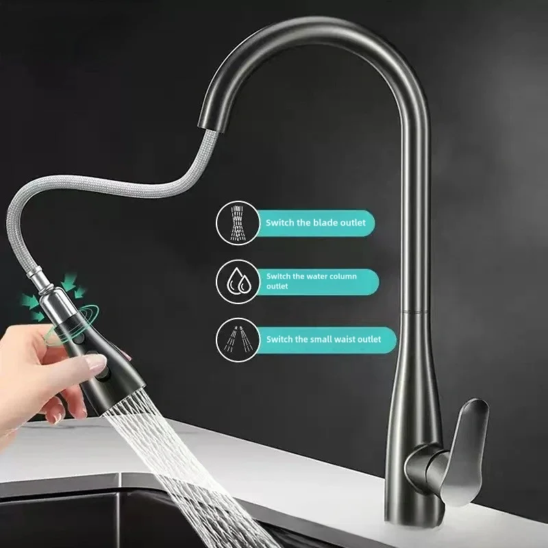 Modern kitchen faucet with detachable spray head in use.