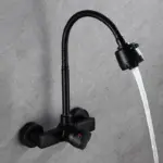 Matte black wall-mounted kitchen faucet with flexible spout.