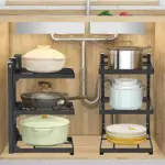 Under-sink organizer with cookware and dishes.