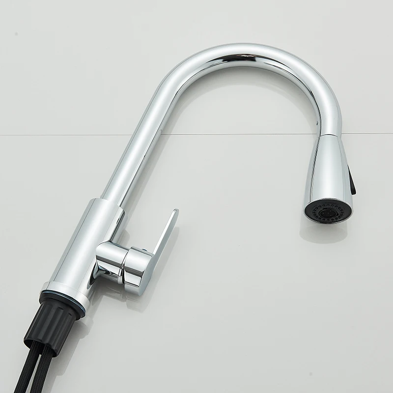 Modern chrome kitchen faucet with a sleek design.