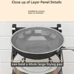 Close-up of a kitchen pot on a stove with a 40cm frying pan and anti-drop guardrail.