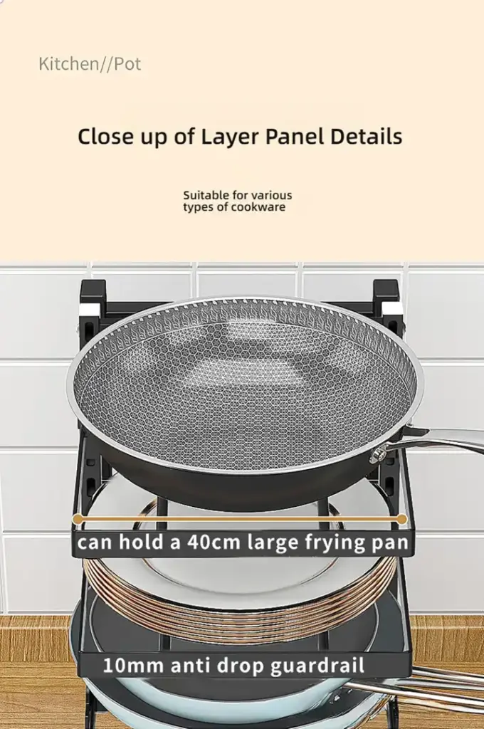 Close-up of a kitchen pot on a stove with a 40cm frying pan and anti-drop guardrail.