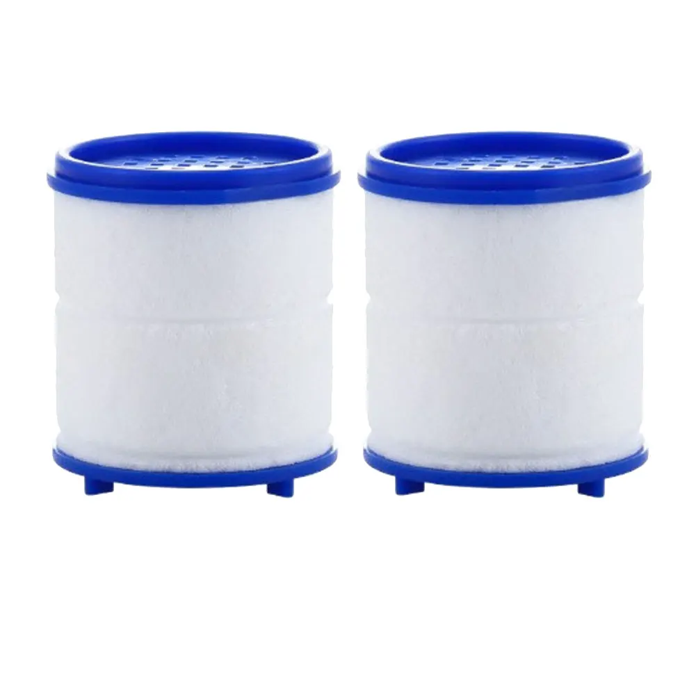 Two cylindrical water filters with blue caps.
