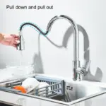 Modern kitchen faucet with pull-down and pull-out features.