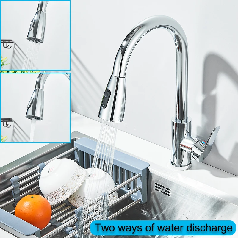 Modern kitchen faucet with dual spray modes over a sink.